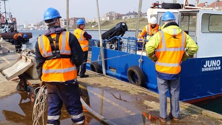Work boat juno sets to sea