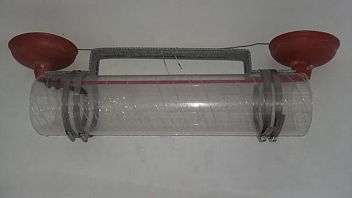 A van dorn sampler, a horizontal glass tube that when placed in water, collects a water sample.