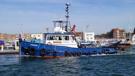 Tug boat Adurni in the port.