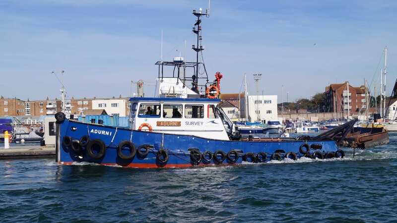 Tug boat Adurni in the port.
