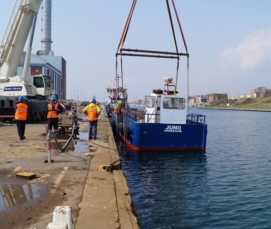 Work boat juno sets to sea