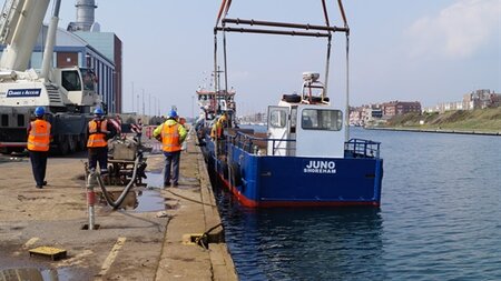 Work boat juno sets to sea