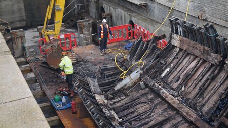 Port dismantles 1950's timber boat