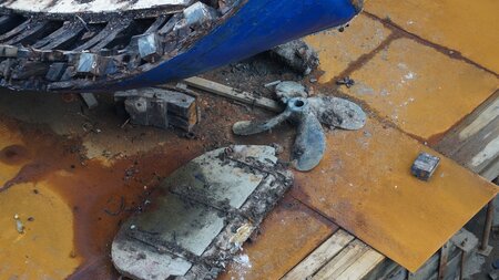 Port dismantles 1950's timber boat